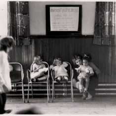 Woman posing with children in the Broomspring Centre. 1970s | Photo: Our Broomhall